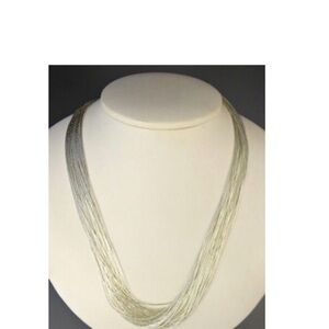 Beautiful 30 strands of liquid sterling silver make up this 18 inch necklace.